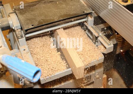 Planing timer on a Thickness Planer machine, wood planer thicknesser Stock Photo