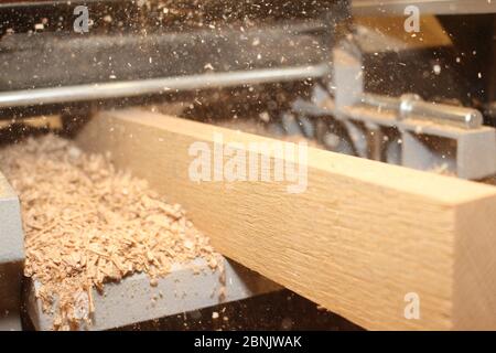 Planing timer on a Thickness Planer machine, wood planer thicknesser Stock Photo