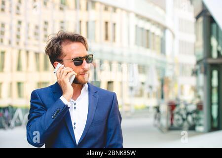 man working outside in Frankfurt Main, Germany Stock Photo