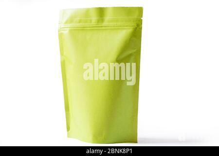 green paper doypack stand up packaging pouch with zipper on white background Stock Photo