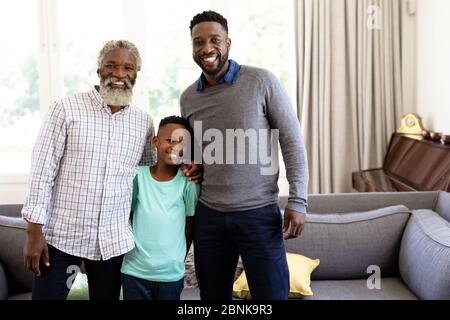 Multi-generation mixed-race family enjoying their time at home Stock Photo