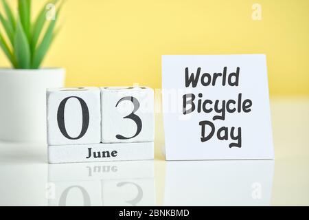 World Bicycle Day 03 third june Month Calendar Concept on Wooden Blocks. Close up. Stock Photo