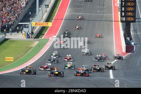 Austin Texas USA, November 18, 2012: Formula One cars at the start of   the inaugural United States Grand Prix at the Circuit of the Americas track. The race was won by Team McLaren Mercedes driver Lewis Hamilton.  ©Bob Daemmrich Stock Photo