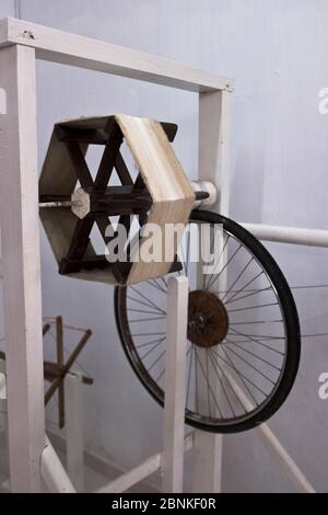 dh  SILK SRI LANKA Spinning silk thread on a spool equipment at Natural Silk Factory Galle nobody Stock Photo