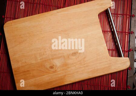 STILL LIFE OF A WOODEN CUTTING BOARD Stock Photo