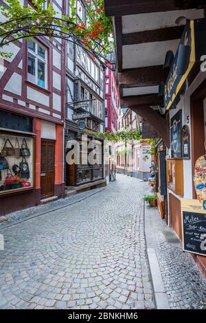 historic Moselle road from Bernkastel-Kues, Mittelmosel, centuries-old wine bars and restaurants in half-timbered houses, a reflection of the Middle Ages Stock Photo