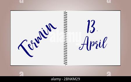 A desk diary shows the date April 13th Stock Photo