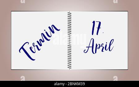 A desk diary shows the date April 17th Stock Photo