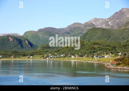 Beautiful scenic landscape of fjords, islands, village & inside passages; the Andfjorden & Vestfjorden, between Bodo & Hammerfest, Norway. Stock Photo