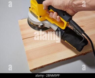 Construction of a wooden shelf, do-it-yourself production, step-by-step, step 1 sanding Stock Photo