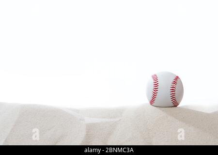 Baseball in the sand on white background . Team sport concept Stock Photo