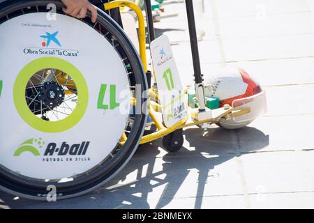 Valencia, Spain. February 15, 2020 - Adaptive sports day. Detail of an adaptive soccer or football wheelchair. System to catch and shoot the ball Stock Photo