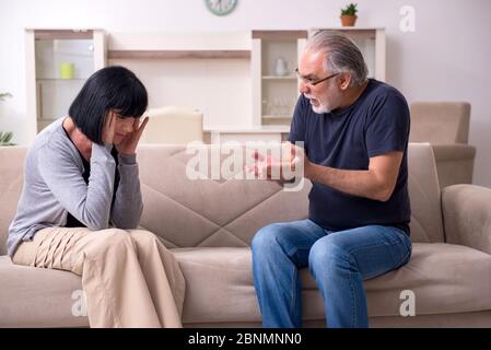Old couple having argument at the home Stock Photo