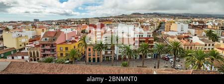 The top of highest church tower. Wide angle panorama of the historic town of San Cristobal de La Laguna in Tenerife showing streets and tiled roofs of Stock Photo