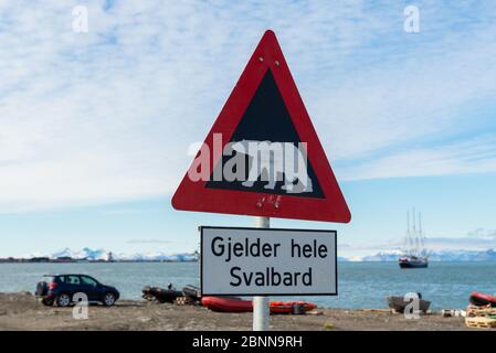 Attention - polar bear warning signs in Longyearbyen, Svalbard archipelago, Norway (Translations for non-English text: 'Applies to all of Svalbard' Stock Photo