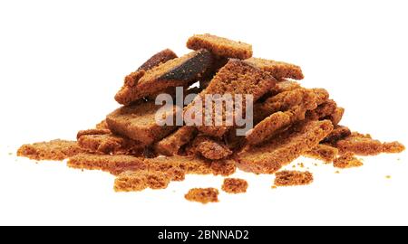 rye crackers, small dried pieces of bread with spices, delicious fast food isolated on white background Stock Photo