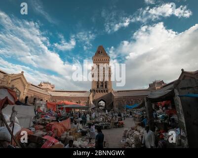 People Selling Different Things In The Beautiful Architecture Of Empress Market Karachi Building, A Historical Landmark In Karachi, Sindh, Pakistan 11 Stock Photo