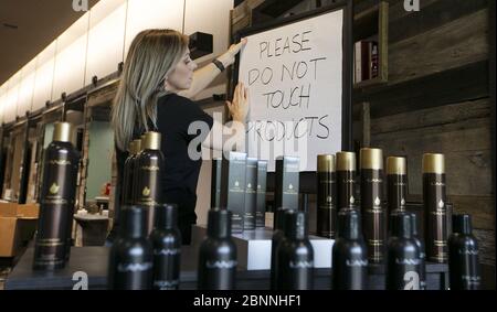 Chesterfield, United States. 15th May, 2020. Angie Lorenz restocks hair color, as she prepares ...