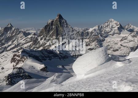 Switzerland, Valais, Zermatt, snowdrifts on the ridge of the Breithorn with Dent d'Herens, Matterhorn, Dent Blanche and Grand Cornier Stock Photo