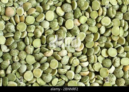 Dry chopped green peas. Food background. Macro. Stock Photo