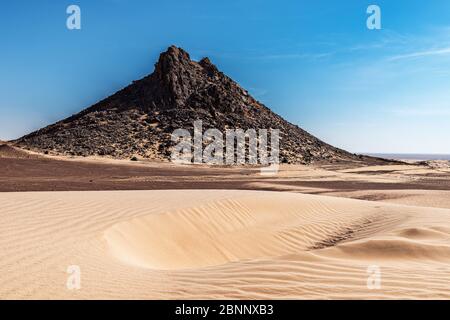 Deserts, sand, dunes, salt dome, red sand, red dunes, rock, mountain, elevation, blue sky, midday light Stock Photo