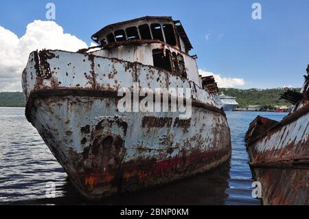 Abandoned boats in Rabaul Harbour, Papua New Guinea Stock Photo