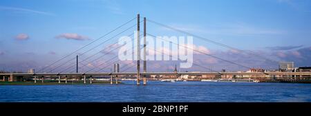 Panoramic view of Rheinkniebrücke (Rhine Knee Bridge) over the Rhine River.  Düsseldorf, Germany Stock Photo