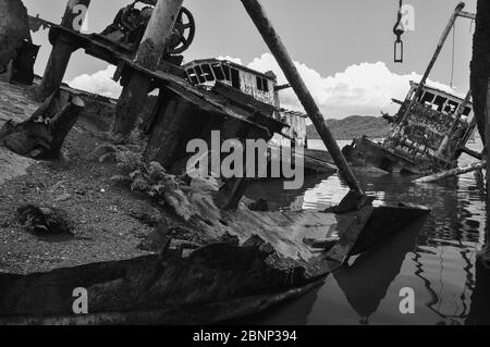 Abandoned boats in Rabaul Harbour, Papua New Guinea Stock Photo