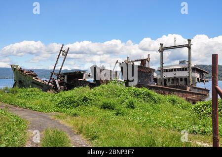 Abandoned boats in Rabaul Harbour, Papua New Guinea Stock Photo