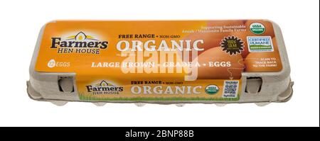 Winneconne,  WI - 15 May 2020:  A package Farmers Hen house organic free range large brown eggs  on an isolated background Stock Photo