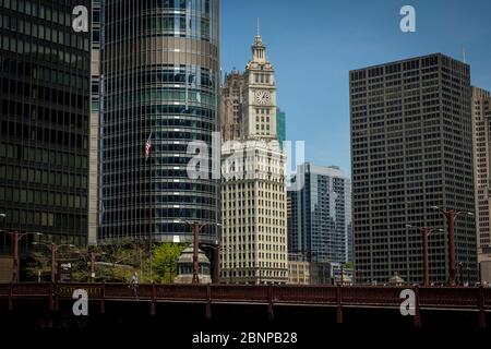Chicago, USA. 15th May, 2020. A pedestrian wearing a protective mask crosses State Street bridge on Friday May 15, 2020 in Chicago, IL. (Photo by Christopher Dilts/Sipa USA) Credit: Sipa USA/Alamy Live News Stock Photo