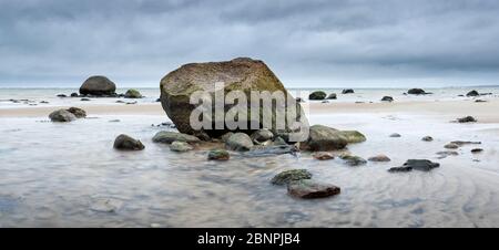 Panorama, sandy beach with boulders, stones on the beach of the Baltic Sea, cloudy sky, stormy sea, near Wismar, Mecklenburg-West Pomerania, Germany Stock Photo