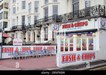 Fish and chips takeaway restaurant in seaside resort Brighton, East Sussex, United Kingdom. Stock Photo