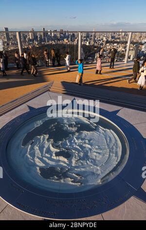 Japan, Honshu, Tokyo, Shibuya, Shibuya Scramble Square Building Rooftop Viewing Area, World Compass Map Stock Photo