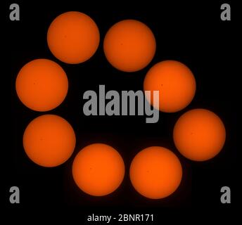 London, UK. 9th May 2016. Sequence of planet Mercury (lower left) beginning its transit of the sun, with sunspots towards centre. Stock Photo