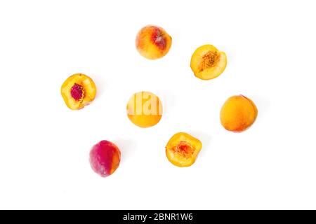 Tasty ripe peaches isolated on white background. Sweet summer fruits. Top view. Flat lay Stock Photo