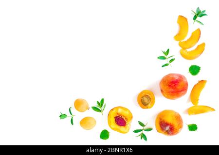 Ripe peaches with leaves isolated on white background. Summer fruit pattern. Top view. Flat lay Stock Photo
