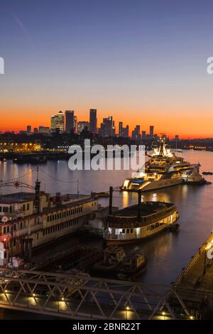 England, London, Canary Wharf Skyline and River Thames at Dawn Stock Photo