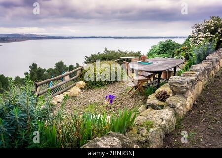 Terrace with a view over the Étang de l'Ayrolle in winter in Bages. Located in the Narbonnaise en Méditerranée Regional Nature Park. Stock Photo