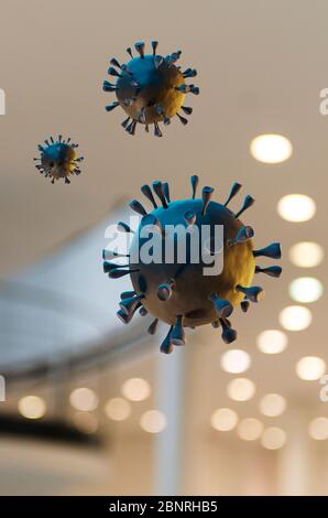 Corona virus in front of an architectural background Stock Photo