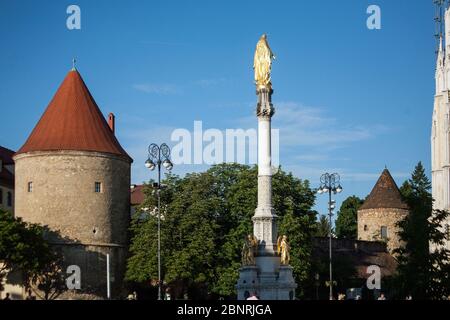 Golden Virgin Mary and four angels statues at Kaptol Square near St Stephen cathedral. Stock Photo