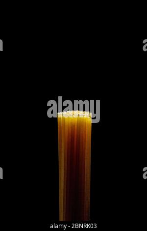 bunch of spaghetti on a black background Stock Photo
