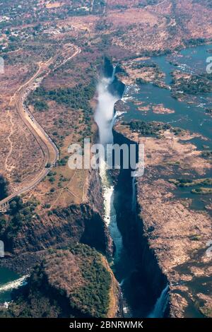 Spectacular Aerial of Victoria Falls Waterfall and Bridge across the Zambezi, Zimbabwe, Africa in Portrait Orientation Stock Photo