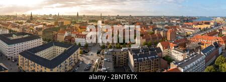 Panoramic view of the Copenhagen cityscape from the Christianshavn neighborhood at sunset. Denmark. Urban travels Stock Photo