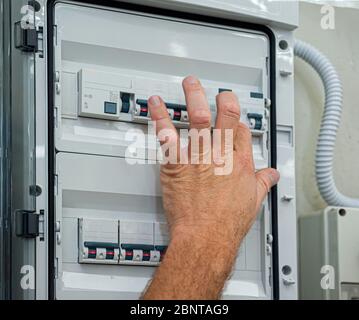 Turning off the power is testing electrical equipment. Stock Photo