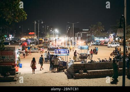 Goa, India - February 13, 2020: Sellers Of Ice Cream On Famous Colva Beach In Night Time. Stock Photo