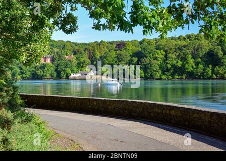 View across the Menai Strait from the Belgian Promenade at Menai Bridge on Anglesey in North Wales Stock Photo