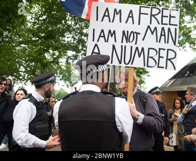 London, UK. 16th May, 2020. Demonstrators opposed to the Coronavirus Lockdown hold a mass rally in Hyde Park. Similar rallies are being held across the UK. Credit: Tommy London/Alamy Live News Stock Photo