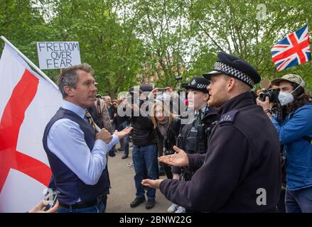 London, UK. 16th May, 2020. Demonstrators opposed to the Coronavirus Lockdown hold a mass rally in Hyde Park. Similar rallies are being held across the UK. Credit: Tommy London/Alamy Live News