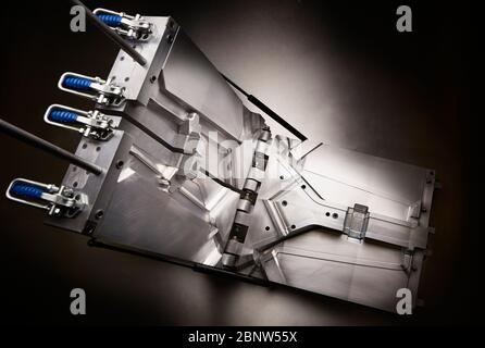 Top view of a injection molding die on studio background Stock Photo